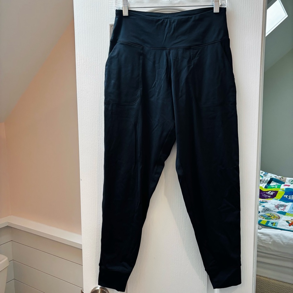Unbranded black yoga or work pants with side pockets
